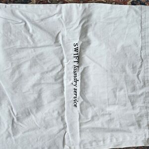 SLS Hotels Swift Laundry Service White Cloth